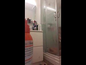 Spying on curvy redhead and her big naked ass Picture 2