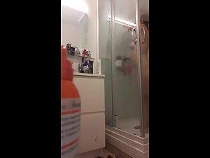 Spying on curvy redhead and her big naked ass Picture 5