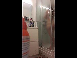 Spying on curvy redhead and her big naked ass Picture 6