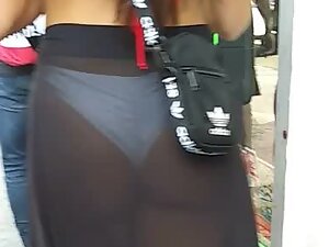 Bubbly butt is shamelessly visible through transparent skirt