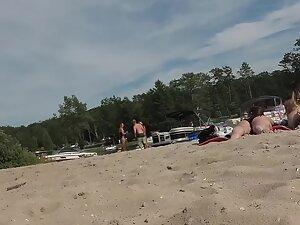Voyeur examines two hot friends chilling on the beach Picture 8