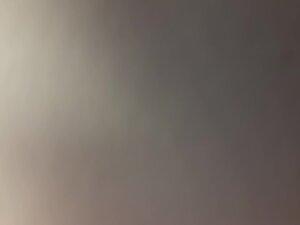 Naked girl checks herself and wipes sweat after tanning Picture 2