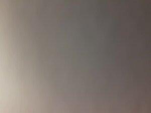 Naked girl checks herself and wipes sweat after tanning Picture 3