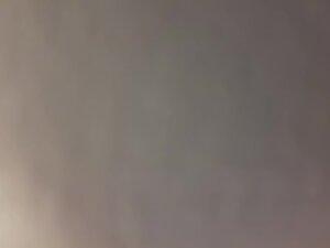 Naked girl checks herself and wipes sweat after tanning Picture 4