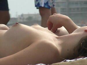 Peeping on topless lesbians on the beach Picture 8