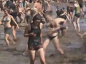 Muddy teens having fun on a rock festival