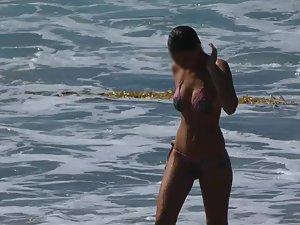 Watching a busty girl step out of water Picture 1