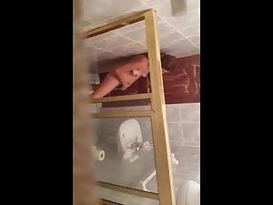 Window peep on girl looking at herself during masturbation Picture 5