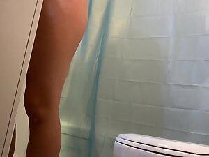 Spying on hairy pussy when she undresses for shower Picture 5