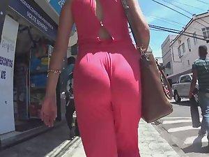 Fancy woman got a wedgie in pink jumpsuit Picture 2