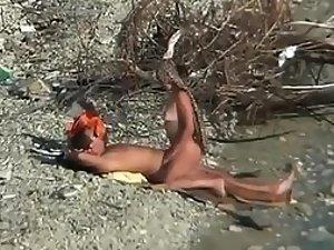 Spying on beach sex from a far away Picture 1