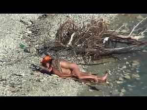 Spying on beach sex from a far away Picture 7