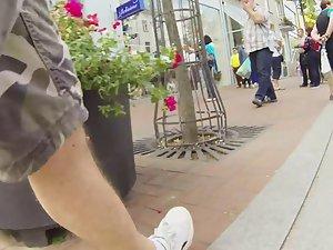 Following and peeping up her shorts Picture 1