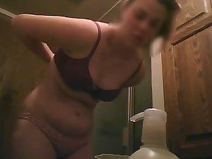 Chubby girl showers on a hidden camera Picture 2