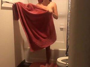 Spying on sweet naked girl in bathroom Picture 1