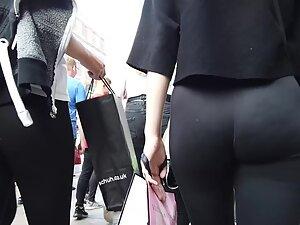 Voyeur focuses on hot ass in black leggings Picture 6