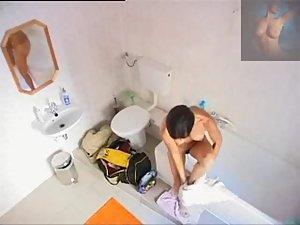 Sweet girl pissing and showering off Picture 7