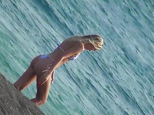 Hottie in thong bikini can't decide if she should swim Picture 7