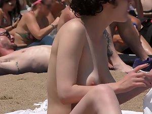Very curly hair and very nice topless tits on beach Picture 2