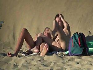 Couple getting horny on a beach Picture 6