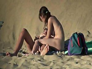 Couple getting horny on a beach Picture 7