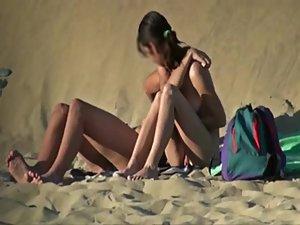 Couple getting horny on a beach Picture 8