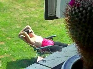 Neighbor spied while tanning her boobs Picture 4