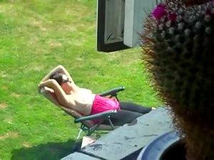 Neighbor spied while tanning her boobs Picture 6
