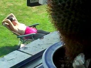 Neighbor spied while tanning her boobs Picture 8