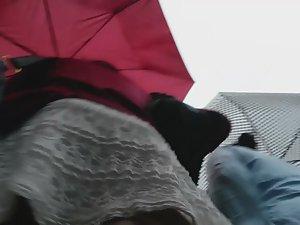 Gorgeous ass in upskirt on rainy day Picture 1