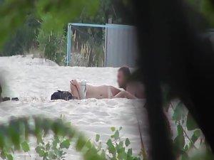 Peeping on two beach fucks in progress Picture 2