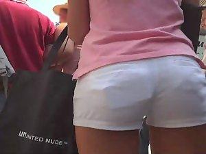 Gorgeous girl in tight white shorts Picture 3