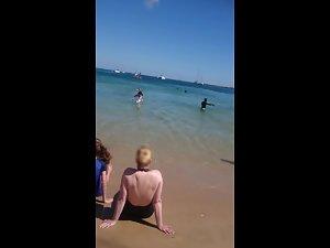 Inspection of perky ass while she has fun on beach Picture 1