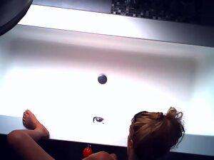 Hidden camera caught her getting off with two dildos Picture 1