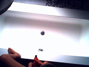 Hidden camera caught her getting off with two dildos Picture 3