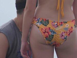Zooming in on nice ass in very colorful bikini Picture 7