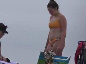 Zooming in on nice ass in very colorful bikini Picture 8