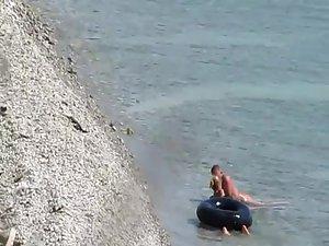 Three horny nudists spied having sex Picture 6