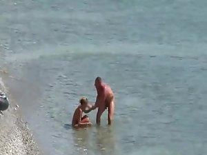 Three horny nudists spied having sex Picture 7