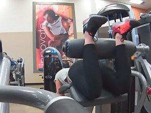 Sexy girl does leg curls in gym Picture 3