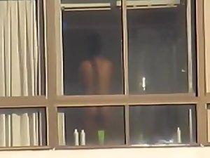 Black girl peeped while taking a shower