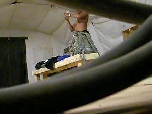 Black girl gets dressed in the tent