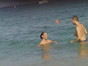 Checking out nudist woman's tattoo Picture 5