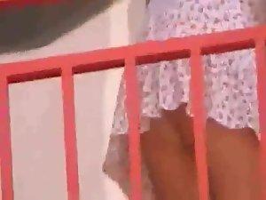 Upskirt of a neighbor at a balcony Picture 6