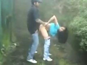 Daring couple fucking in the rain