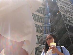Upskirt of sexy rich girl on the street Picture 2