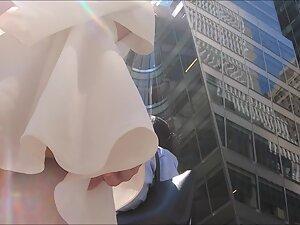 Upskirt of sexy rich girl on the street Picture 4