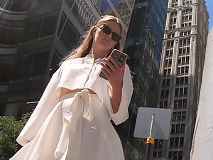 Upskirt of sexy rich girl on the street