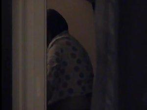 Peeping on a girl preparing for bed Picture 5