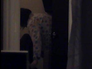 Peeping on a girl preparing for bed Picture 7